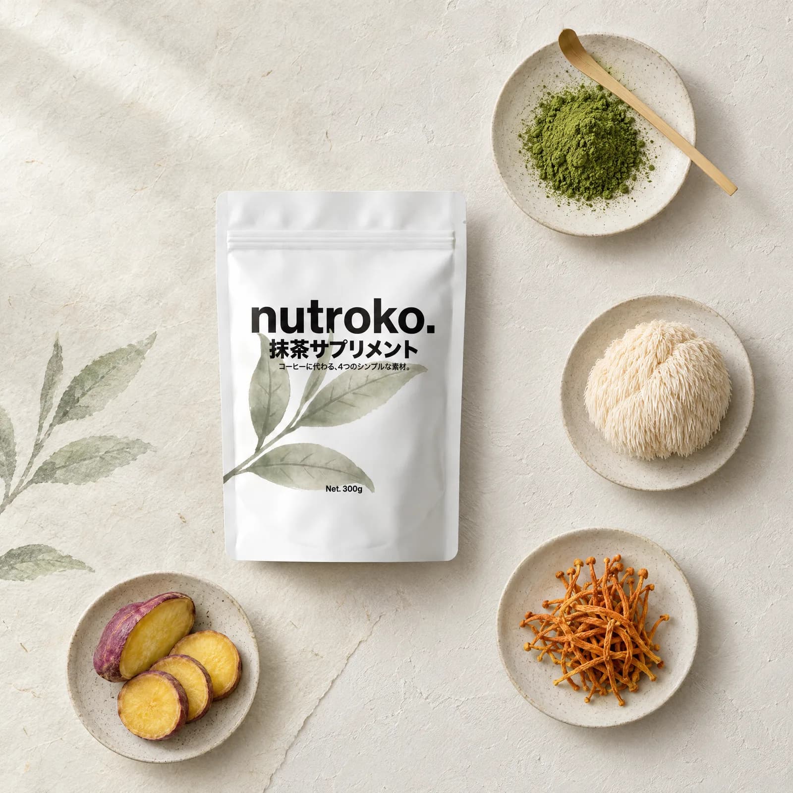 Overhead: the pouch with its four ingredients on small plates: matcha with a bamboo scoop, lion's mane, cordyceps, Kagoshima sweet potato